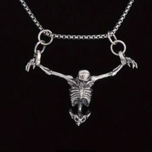 NWOT Hanging skeleton Necklace